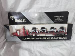 Bobcat Semi With 4 753 Loaders