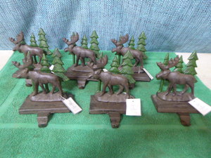 lot 37 image: 6 Silver Tree Cast Iron Moose Stocking Holders