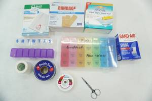 lot 12 image: Pill Organizers, Bandaids, Adhesive tape ,