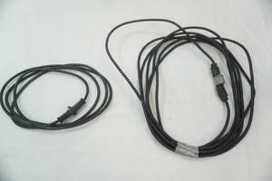 lot 141 image: 2t Black Extension Cords. Length Unknown