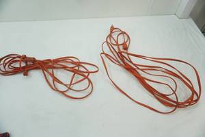 lot 142 image: 2ct Extension Cords. Length Unknown