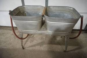 lot 306 image: Vintage Reeves Double Wash Tub with hoses, on wheels, good condition