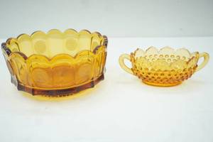 lot 505 image: Vintage Amber Glass Pieces