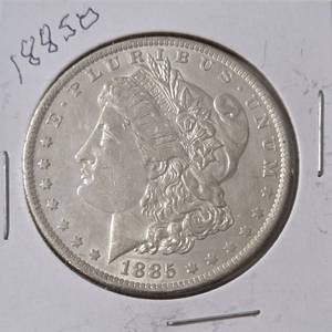 lot 20 image: 1885 O Morgan Silver Dollar