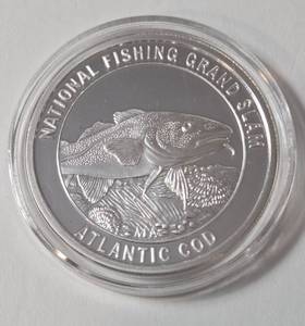 lot 100 image: 1 Oz. Silver Atlantic Cod - National Fishing Grand Slam - Round