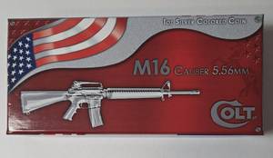 lot 122 image: Colt M16 Caliber 5.56MM - 1 Oz. Silver Colored Coin - in Box with COA