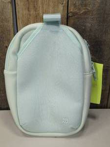 lot 62 image: ALL IN MOTION WATER BOTTLE CROSSBODY BAG -CREAM