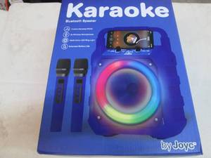 lot 34 image: Karaoke blue tooth speaker...