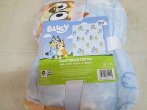 lot 45 image: Bluey 60 x 70 theow...