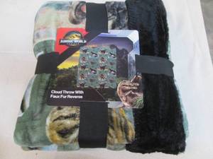 lot 65 image: Jurassic World cloud throw, 50 x 60...