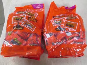 lot 228 image: 2 Bags of Reeses Carmen and chocola...