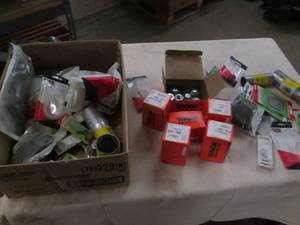 lot 312 image: Box of assorted auto parts...
