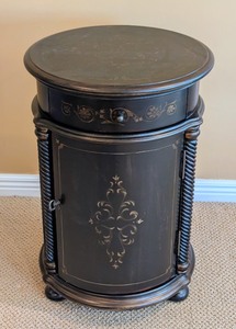 lot 31 image: LR - Hooker Seven Seas Round Accent Storage Table
