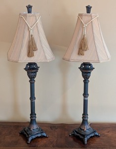 lot 68 image: LR - Pair of 30-Inch Antique-Style Table Lamps with Beige Shade, Tassels, and Ornate Cast-Metal Bases