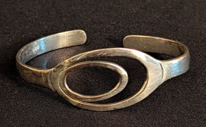 lot 80 image: K - Cuff Bracelet - Sterling Silver, Double-Loop Oval Design