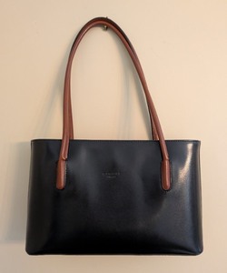lot 106 image: LR - Simone Firenze Handmade Leather Tote - Black with Tan Handles