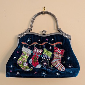 lot 107 image: LR - Vendula London Velvet Christmas Handbag - Embroidered Stockings