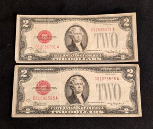 lot 108 image: K - Jefferson Red Seal Two Dollar Bills - 1928 Series (D) Federal Reserve Notes (Pair)