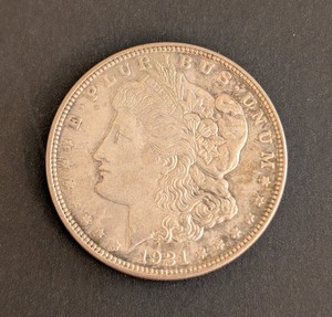 lot 114 image: K - 1921-D Morgan Silver Dollar