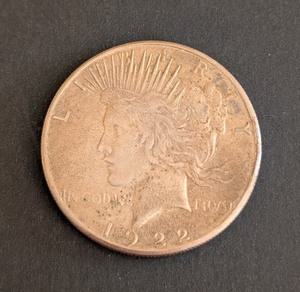 lot 115 image: K - 1922-S Peace Dollar