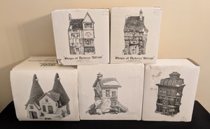 lot 267 image: Shops of Dickens Village Hand Painted Porcelain  Five Dickens Village Houses