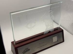 2003 Playoff Absolute Memorabilia Torii Hunter Glass Display With a Piece of his Game-Worn Jersey Authenticated and Serial #d 074150, the Glass Display Has a White Etching of Torii Hunter