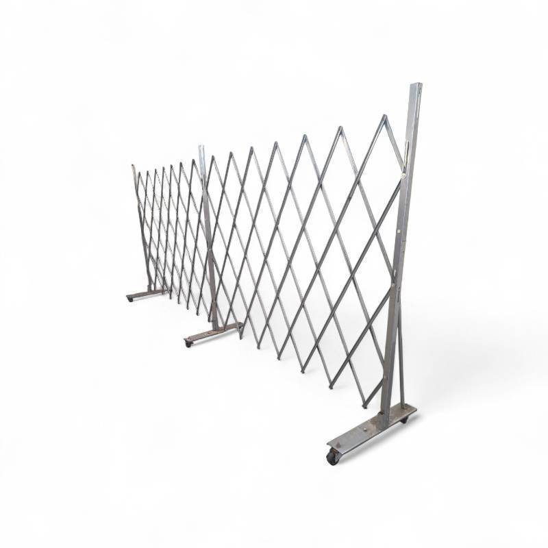 lot 36 image: Folding Security Gate 13 feet X 6.5feet retails for $1700