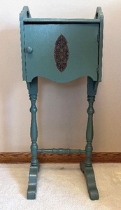 lot 8 image: Cabinet - Vintage Teal Painted on Turned-Leg Stand with Ornate Door Medallion