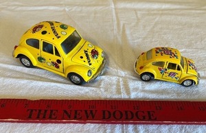 lot 57 image: Diecast Yellow Beetle Toy Cars