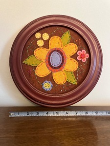 lot 86 image: Sunflower Round Wall Plaque in Dark Red Frame - 9 in Diameter