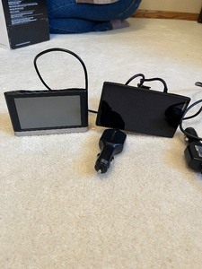 lot 127 image: Garmin GPS Navigators (Lot of 2) with Car Charger & Mounts