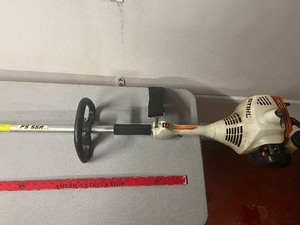 lot 211 image: Stihl FS 55R Gas String Trimmer with Echo 0.095 Nylon Line (1 lb Spool)