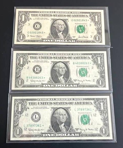 lot 52 image: Uncirculated $1 Federal Reserve Star Notes - 1963A and 2001