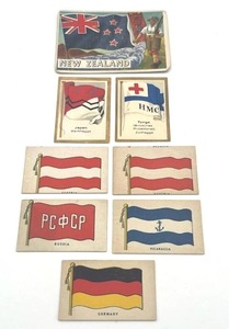 lot 25 image: 1918 Wilbur-Suchard Chocolate Company Candy Cards  Antique German Cigarette Cards  1956 Topps Flags of the World New Zealand #68