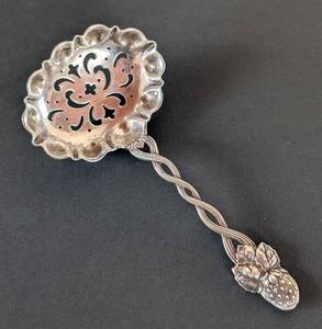 lot 260 image: MB -Vintage TIFFANY & CO Sterling Silver Strawberry-Handle Sugar Sifter