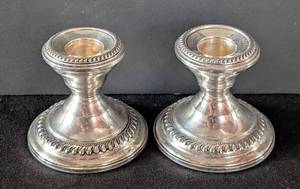 lot 527 image: MB - Pair of Vintage Sterling Silver Weighted Candleholders