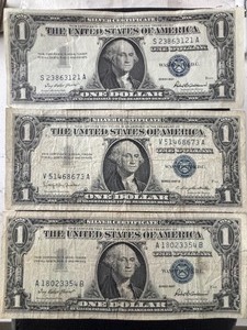 lot 17 image: 1957 Blue Seal $1 Dollar Silver Certificates