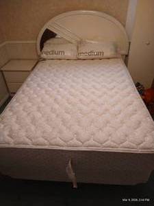 Full-Sized Bed with (2) Pillows