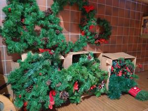 (4) Boxes of Nice Evergreen Garland with Cones, Berries, Bows, Etc.