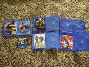 (2) PS4 Games & (4) Empty Cases