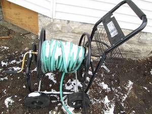 lot 26 image: Heavy duty portable metal hose reel...