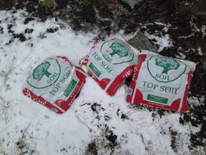 lot 27 image: 3-40lb bags of lawn and garden top ...