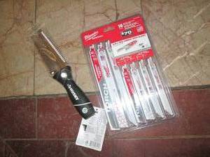 lot 82 image: Husky garden tool and Milwaukee saw...