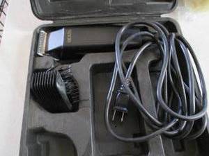 lot 86 image: Andis electric shaver...