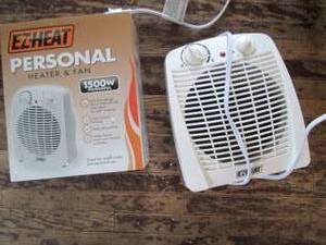 lot 208 image: Pair of small space heaters...