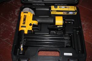 lot 123 image: Dewalt DWFP12233 18 Gauge pneumatic...
