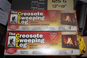 lot 188 image: 2-Boxes Creosote Sweeping Logs...