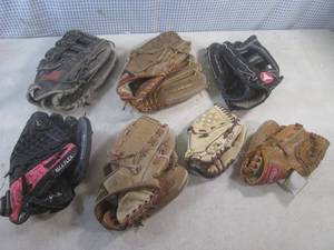lot 38 image: (EW5) Assorted Baseball Gloves...