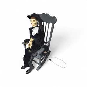 Skeleton with Dog in Rocking Chair