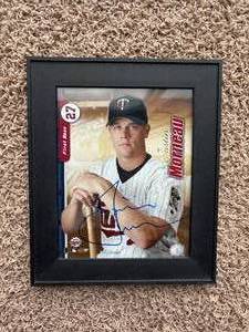 Justin Morneau Autographed Minnesota Twins Issued Picture, 8x10 Picture, Authenticated by MLB, Seal on the Bottom Left Corner